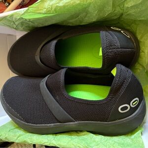 OOFOS Black Slip-On Sneakers with Bright Green Accent
